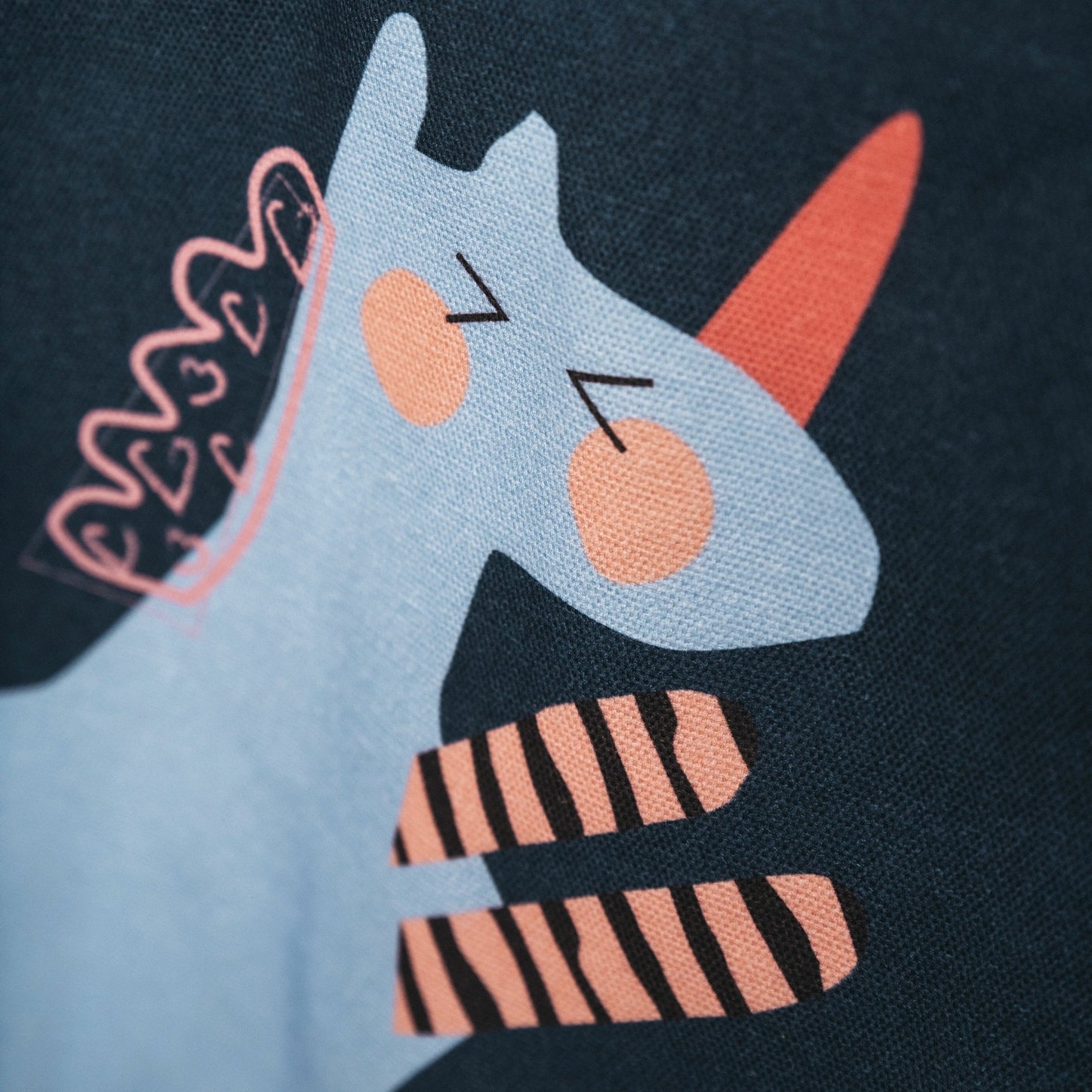 Fundertable textile with unicorn illustration and high-quality printed fabric detail